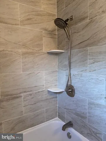 a bathroom with a bathtub