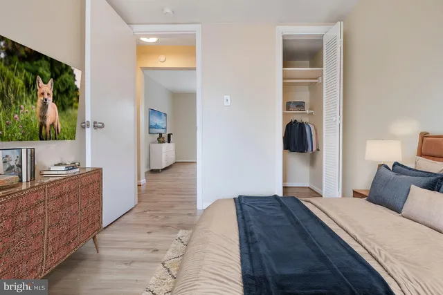 a view of flowing water with large building in front of it