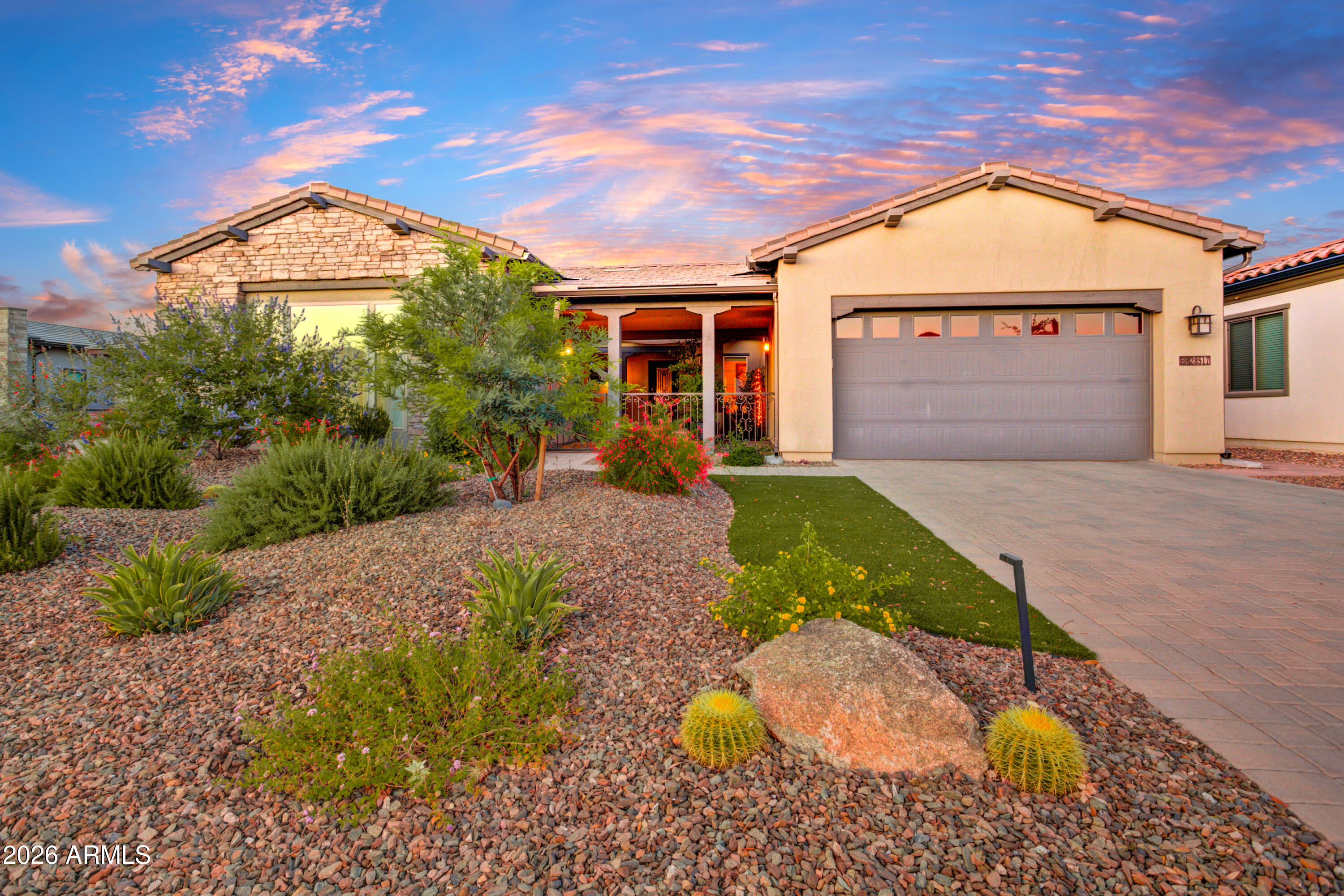 28517 North Camel Rock Court Rio Verde, AZ 85263 - Photo 5 of 39 a front view of a house with a yard and garage