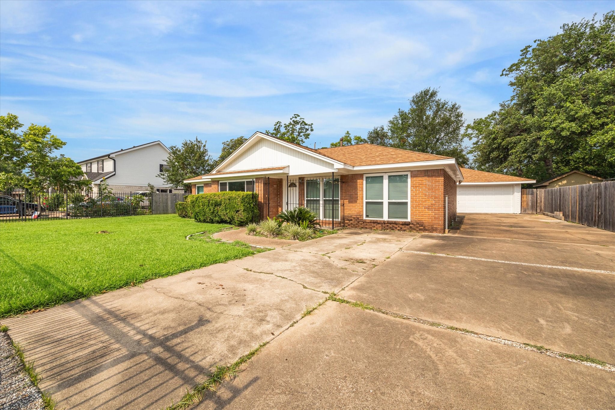3613 Lazy Spring Drive Houston, TX 77080 - Photo 20 of 22 a front view of a house with a yard
