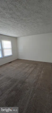 an empty room with a workbench