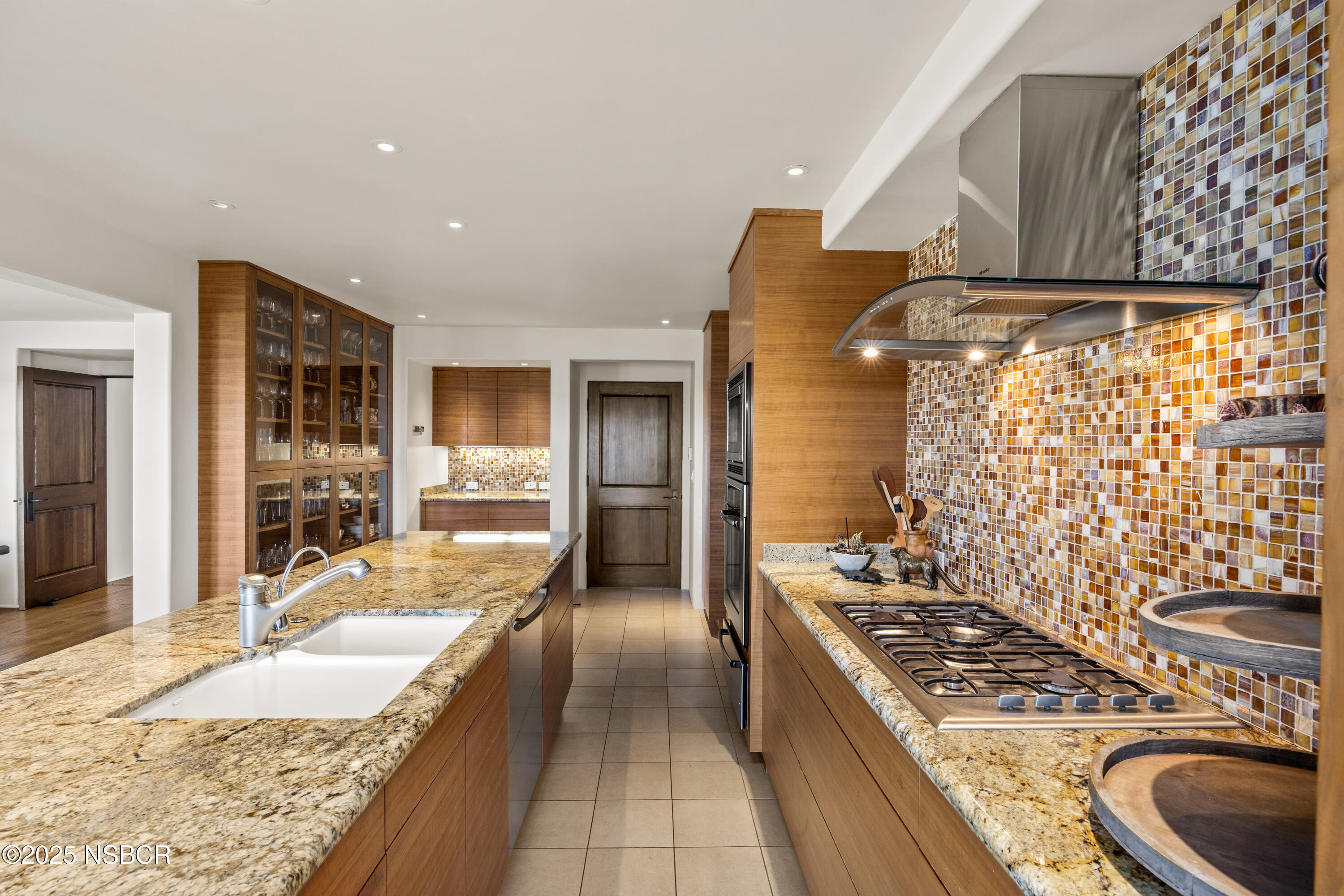 3001 Long Valley Road Santa Ynez, CA 93460 - Photo 13 of 52 a large kitchen with granite countertop a sink and cabinets