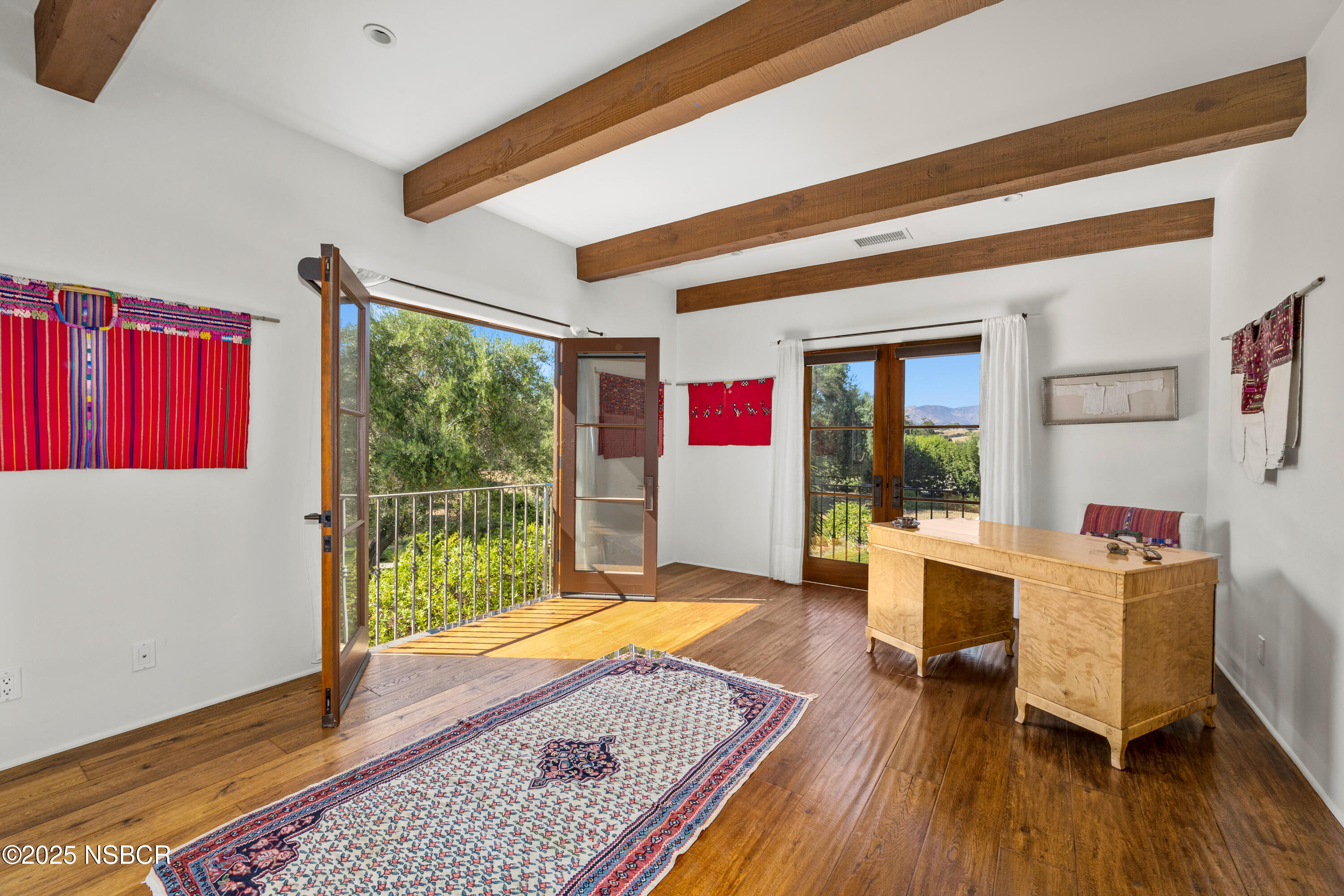 3001 Long Valley Road Santa Ynez, CA 93460 - Photo 24 of 52 a living room with furniture and a wooden floor