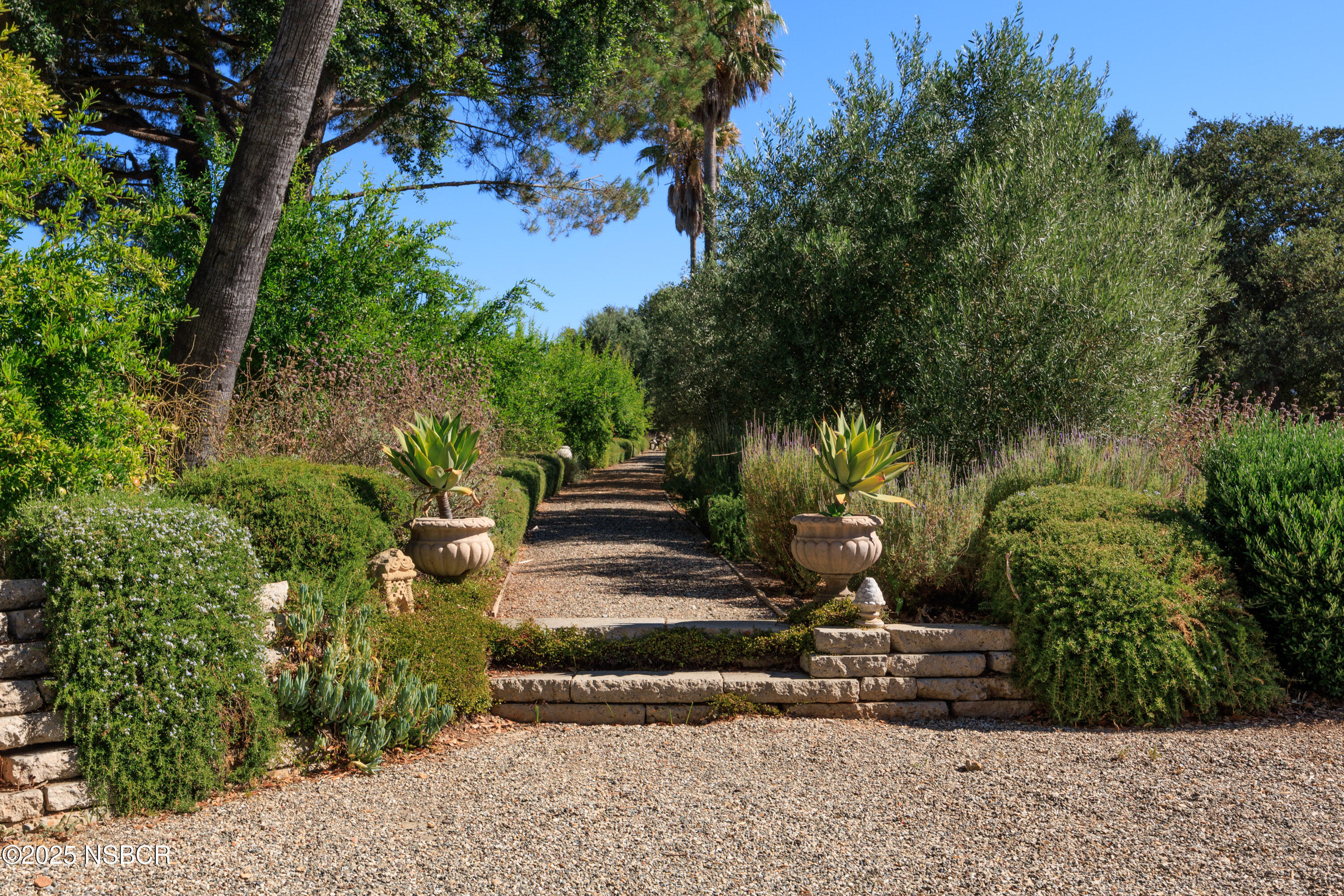 3001 Long Valley Road Santa Ynez, CA 93460 - Photo 36 of 52 a view of a park with plants and a bench