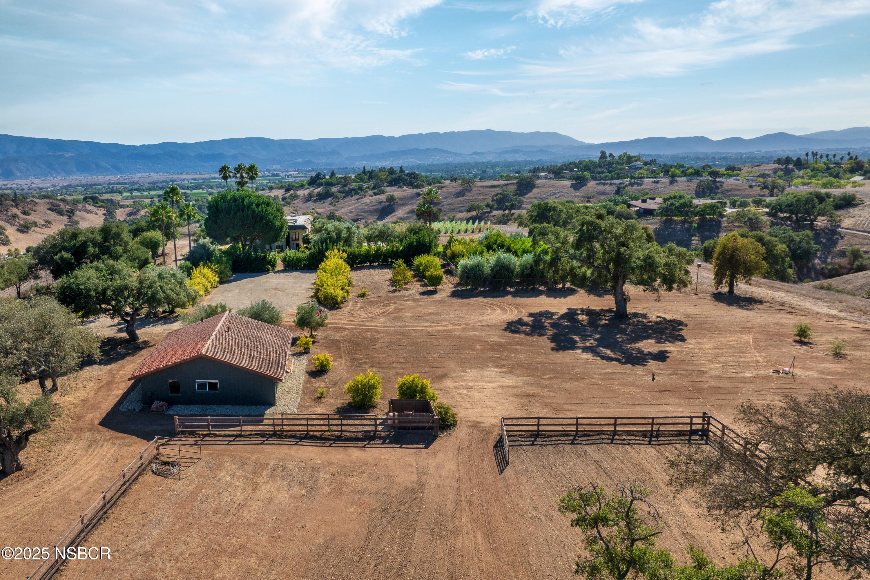 3001 Long Valley Road Santa Ynez, CA 93460 - Photo 43 of 52 an aerial view of a swimming pool with a yard