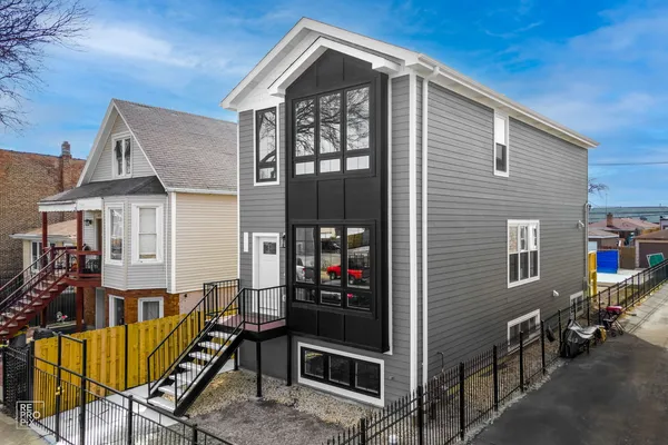 a view of a house with parking area