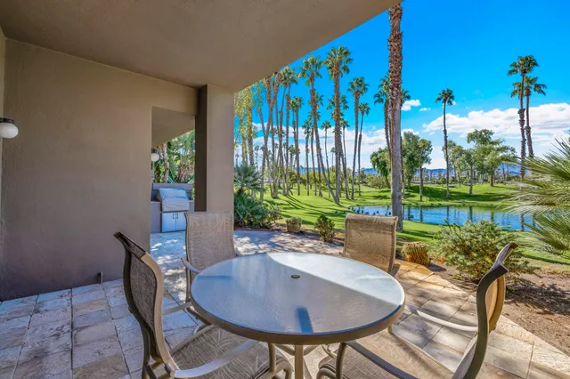 a view of a park with houses