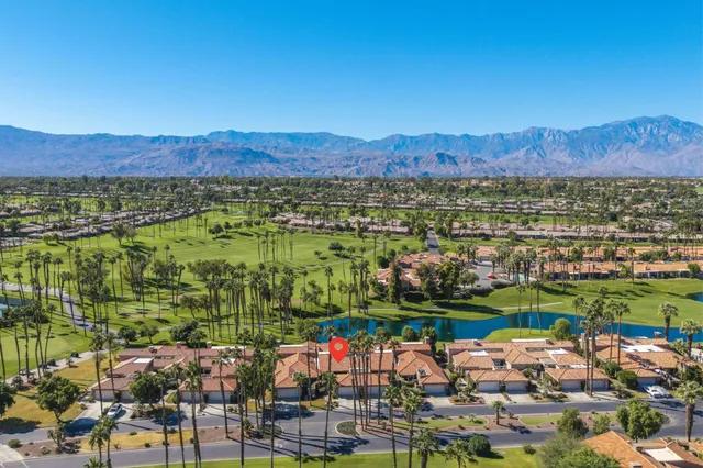 a view of a city with mountains