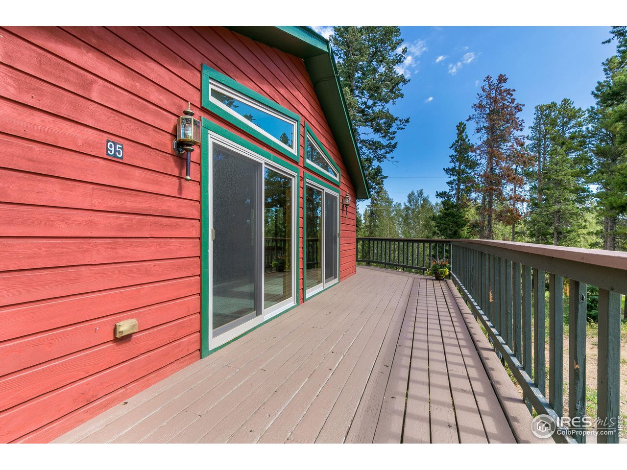 95 Ronnie Road Golden, CO 80403 - Photo 3 of 40 Sunny wraparound deck to enjoy the views