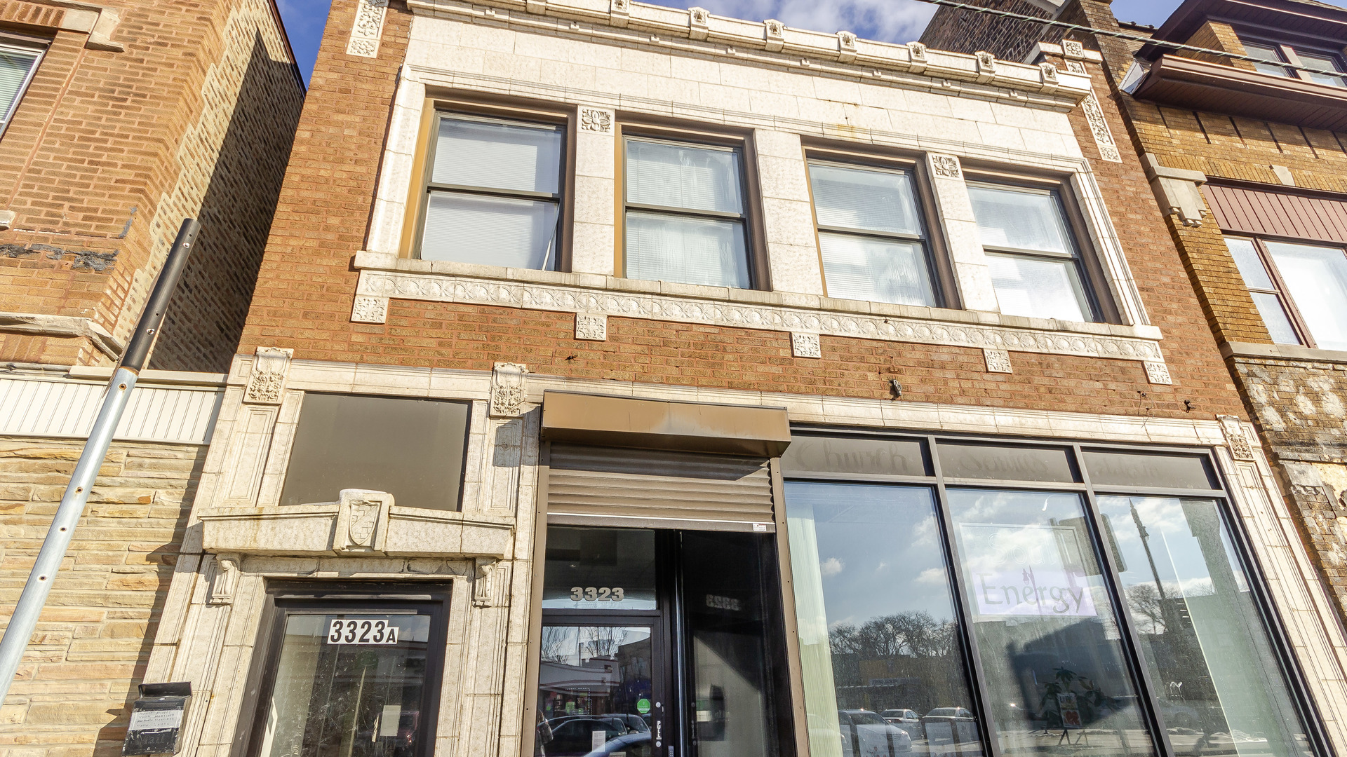 3323 North Pulaski Road Chicago, IL 60641 - Photo 1 of 12 a building with glass windows