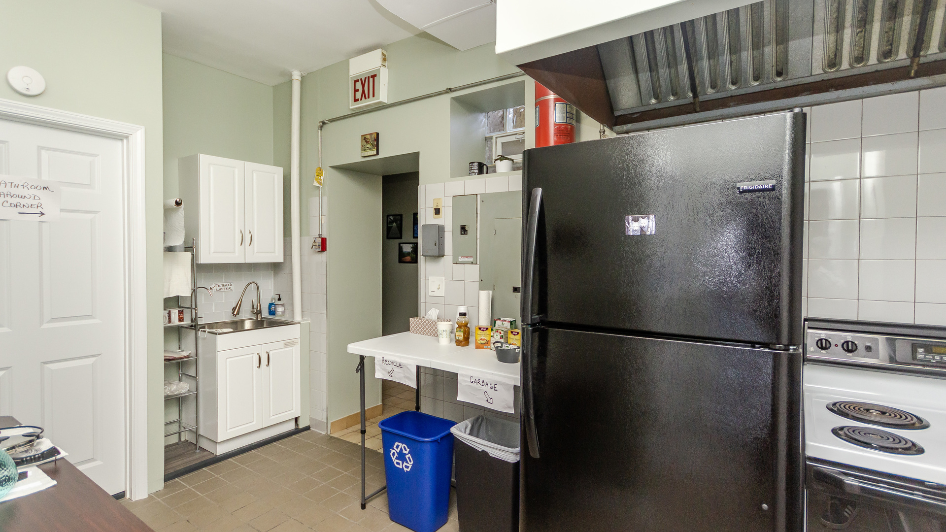 3323 North Pulaski Road Chicago, IL 60641 - Photo 7 of 12 a kitchen with stainless steel appliances granite countertop a refrigerator and a stove