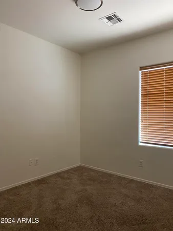 a view of a room and window