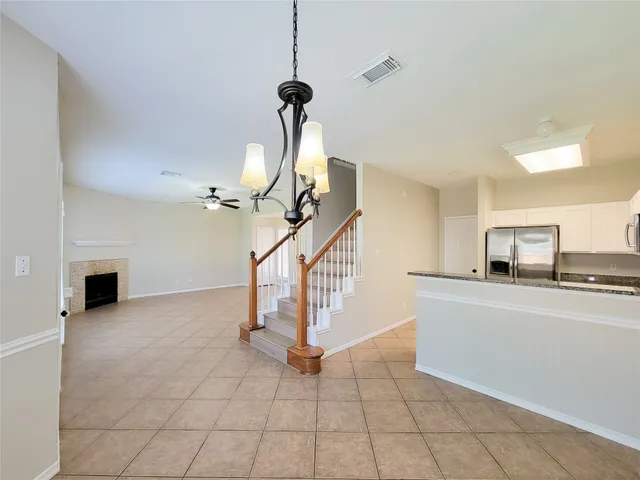 a view of a livingroom with a staircase
