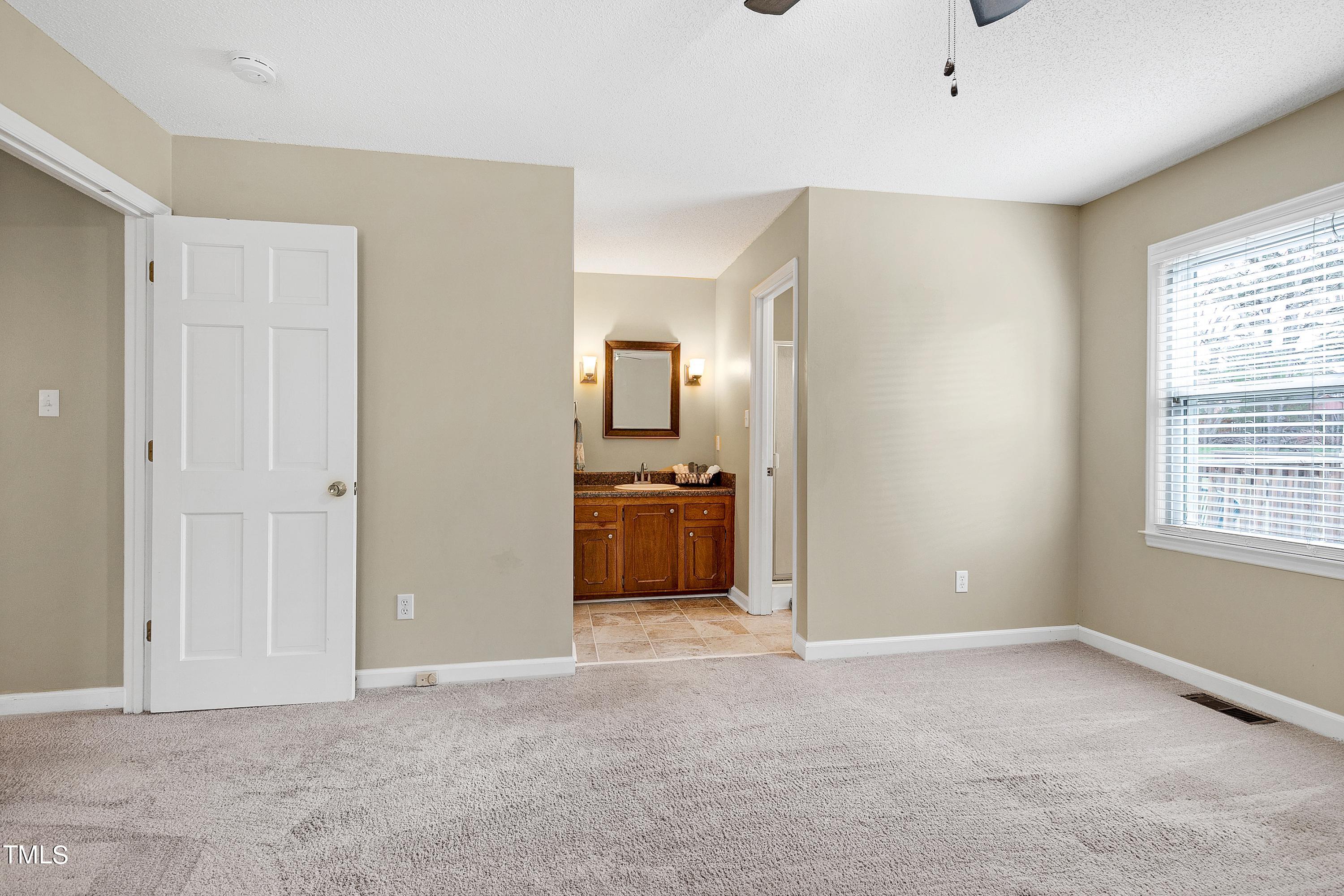 1104 Turner Farms Road Garner, NC 27529 - Photo 22 of 35 View to Bath in Owner's Bedroom