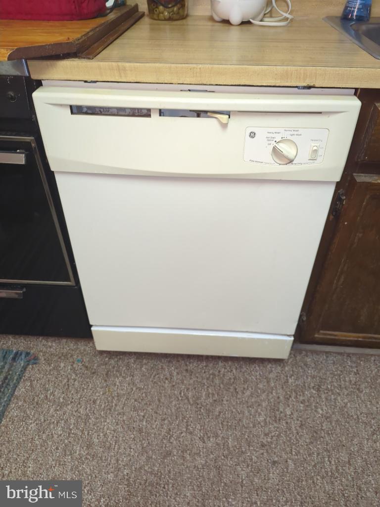 6065 Majors Lane, Unit 1 Columbia, MD 21045 - Photo 13 of 25 a close view of washer and dryer