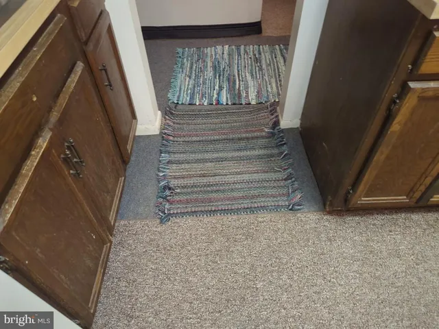 a bathroom with a white bath tub and a shower