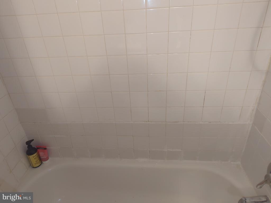 6065 Majors Lane, Unit 1 Columbia, MD 21045 - Photo 21 of 25 a close up of a bathtub
