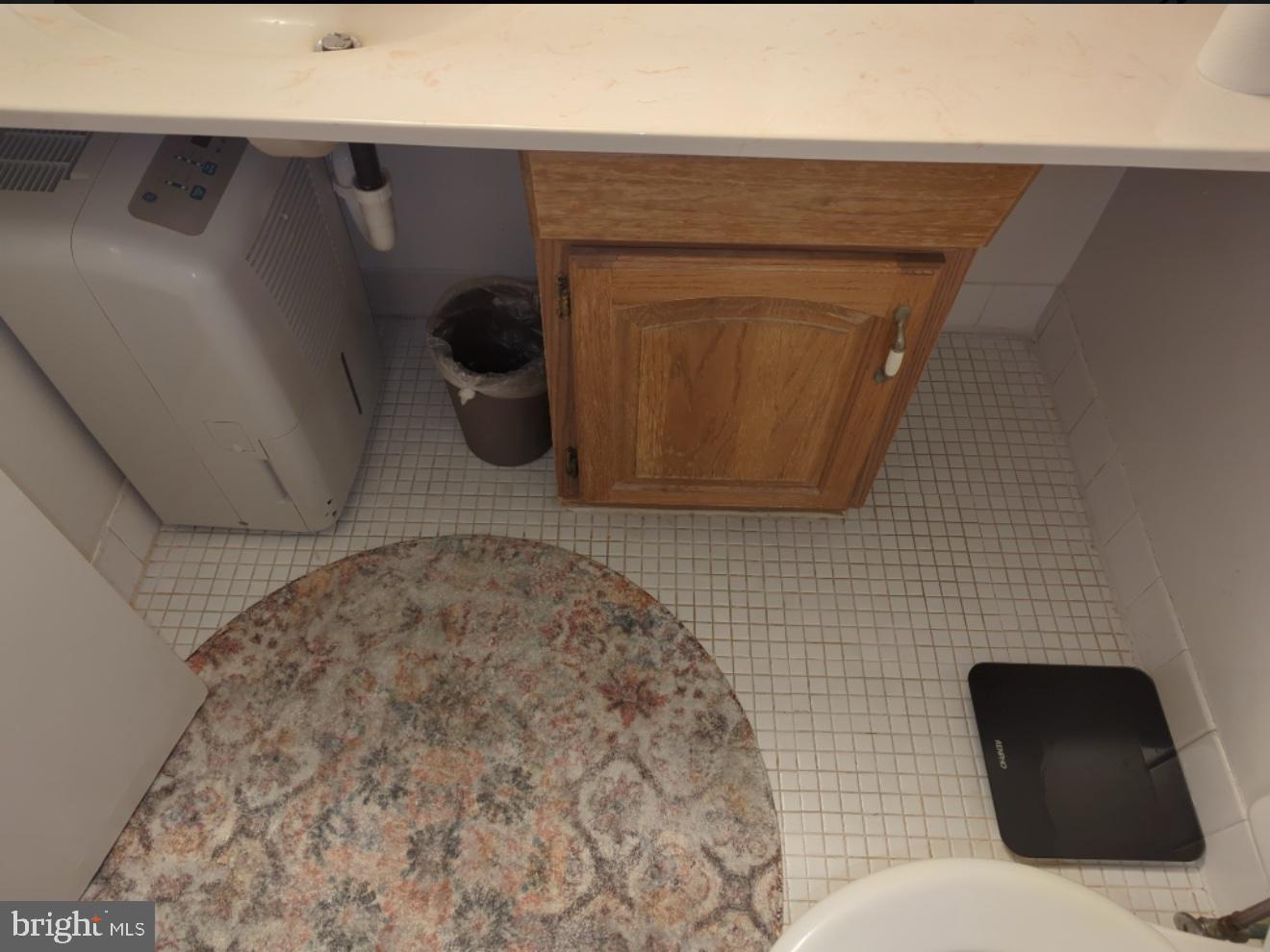 6065 Majors Lane, Unit 1 Columbia, MD 21045 - Photo 23 of 25 a bathroom with a toilet