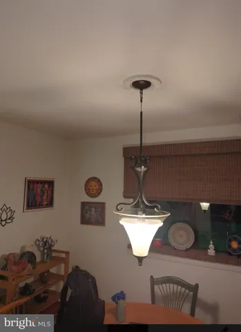 a view of wooden floor with a curtain