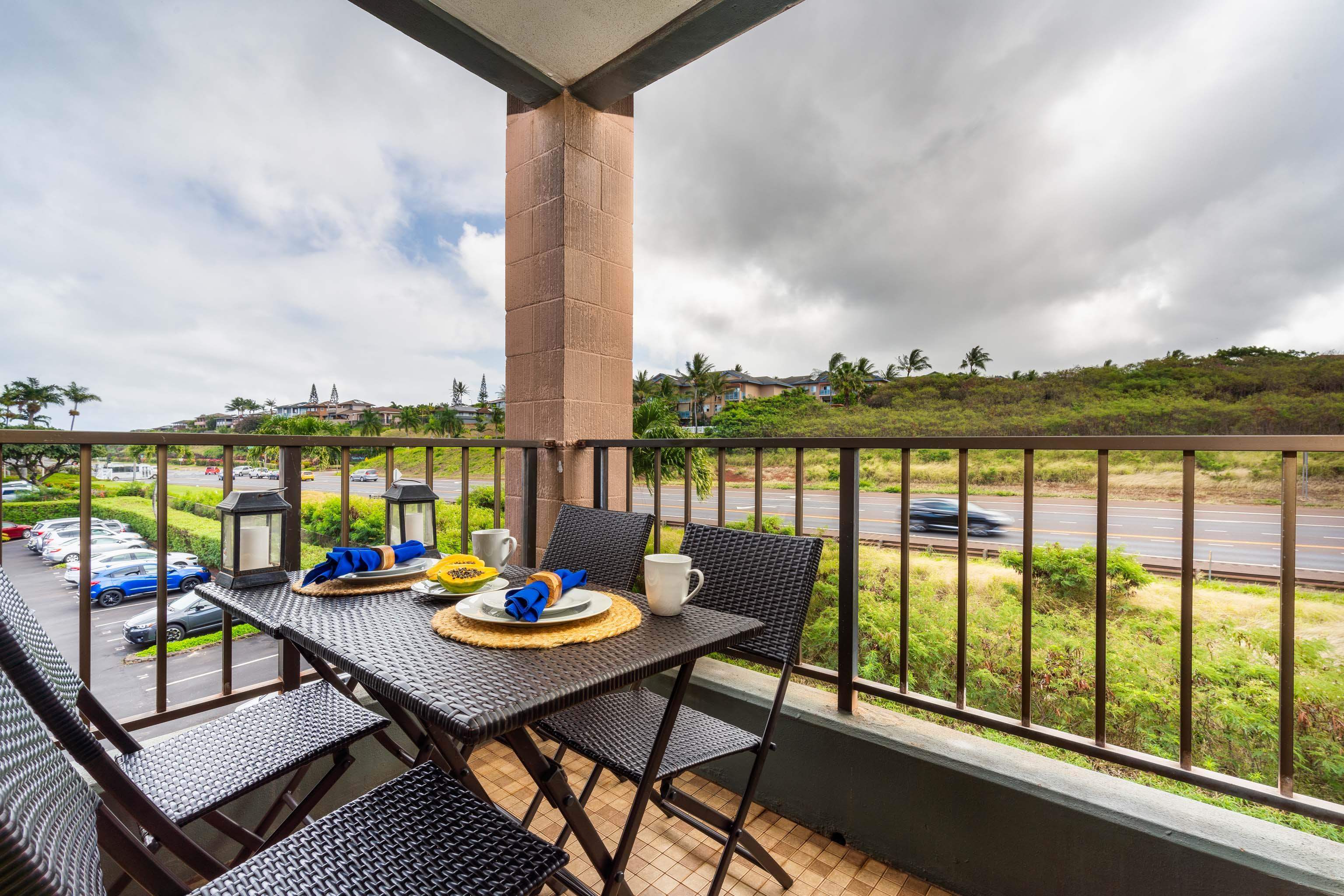4310 Lower Honoapiilani Road, Unit 418 Lahaina, HI 96761 - Photo 7 of 31 an outdoor space with furniture and city view