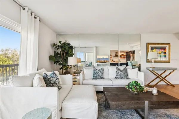 a living room with furniture and a couch