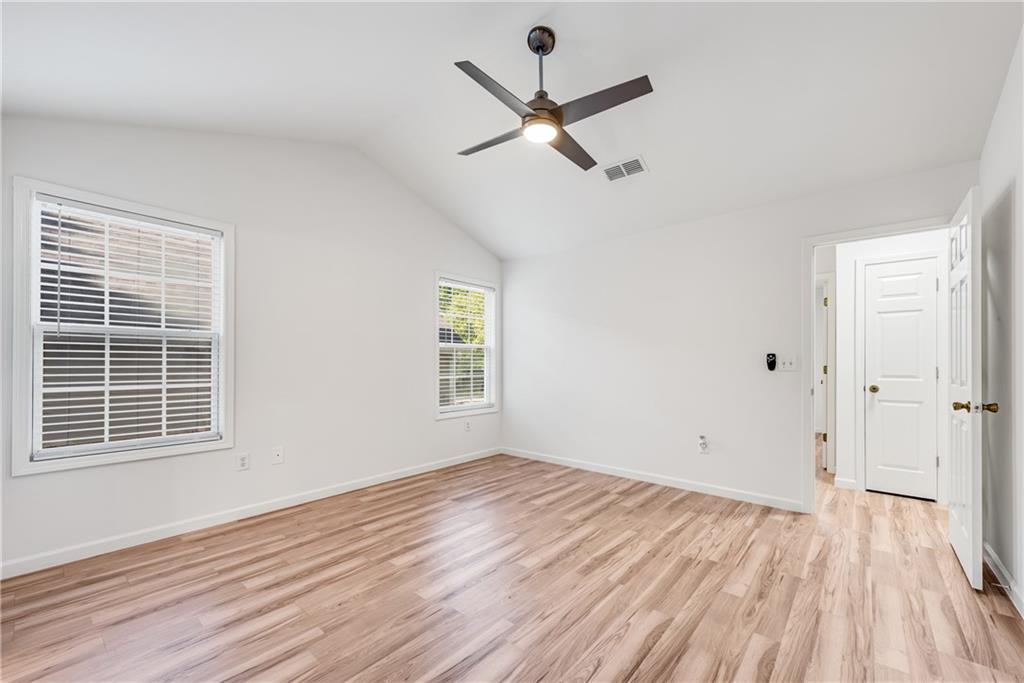 125 Pine Ridge Trace Athens, GA 30605 - Photo 13 of 28 a view of a room with wooden floor and a window