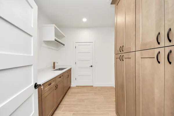 a view of a kitchen with electric appliances