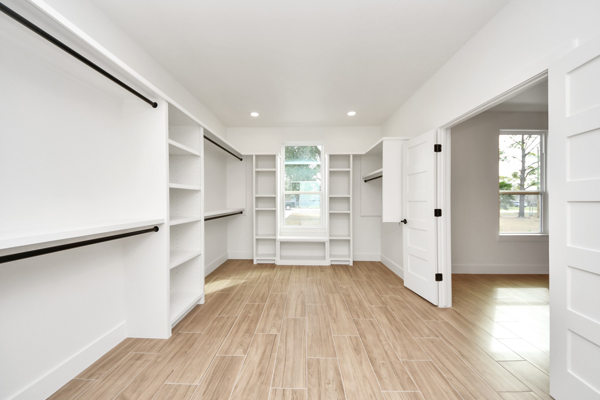 5811 County Road 675B Rosharon, TX 77583 - Photo 29 of 39 a view of empty room with wooden floor and window