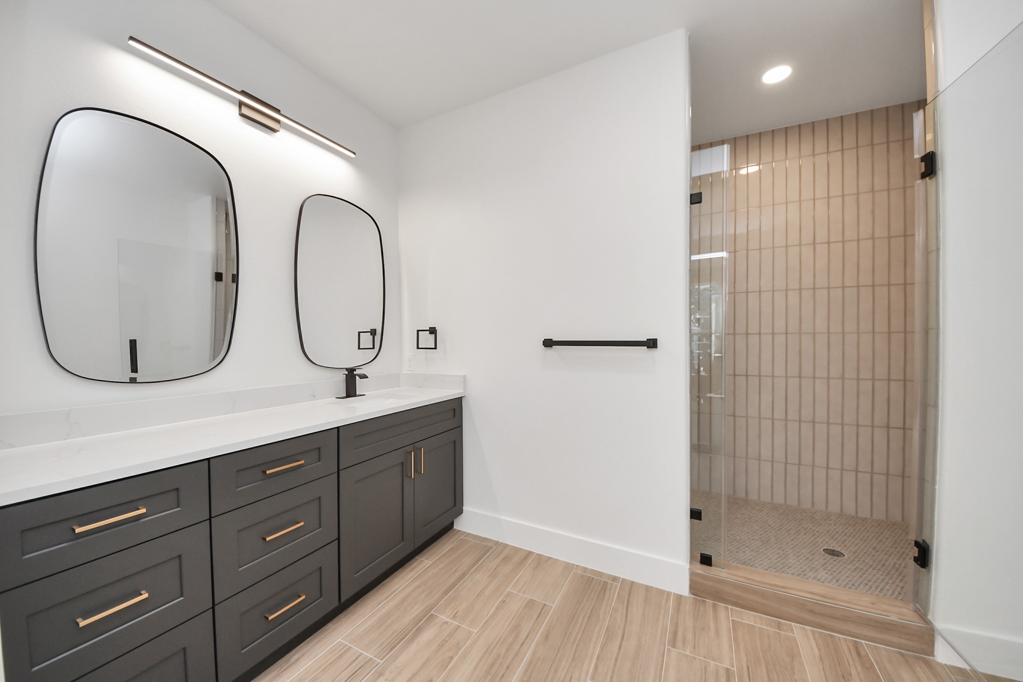 5811 County Road 675B Rosharon, TX 77583 - Photo 31 of 39 a bathroom with a double vanity sink mirror and shower