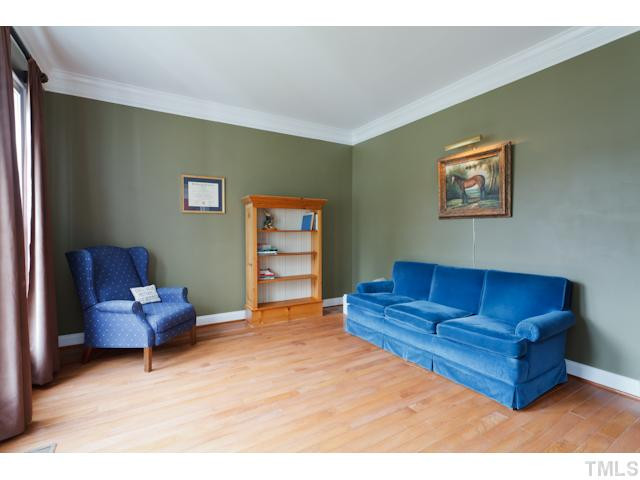 4216 Oakthorne Way Raleigh, NC 27613 - Photo 12 of 24 This formal living space is excellent for a home office. Hardwood Floors and great natural lighting. Crown molding throughout. Living Room