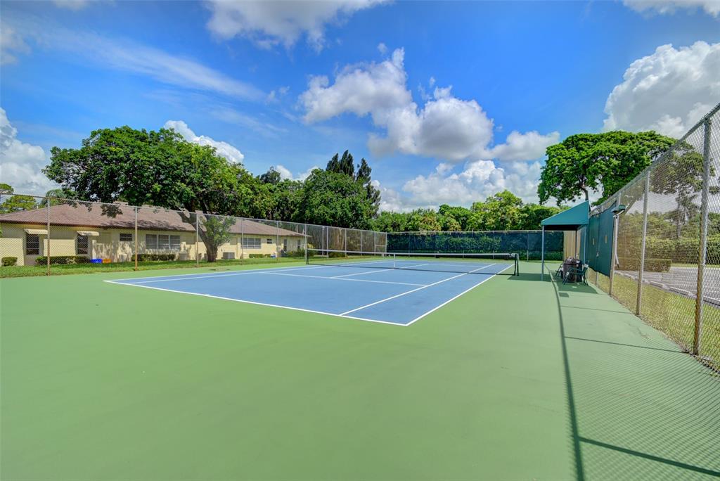 13930 Nesting Way, Unit C Delray Beach, FL 33484 - Photo 40 of 41 a view of a tennis court