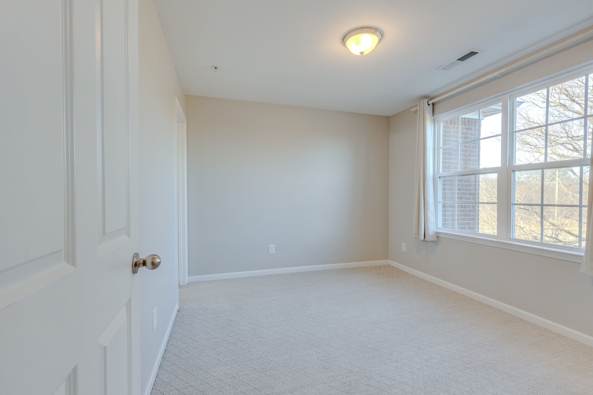 304 Oldbury Lane Spring Hill, TN 37174 - Photo 26 of 41 wooden floor in an empty room with a window