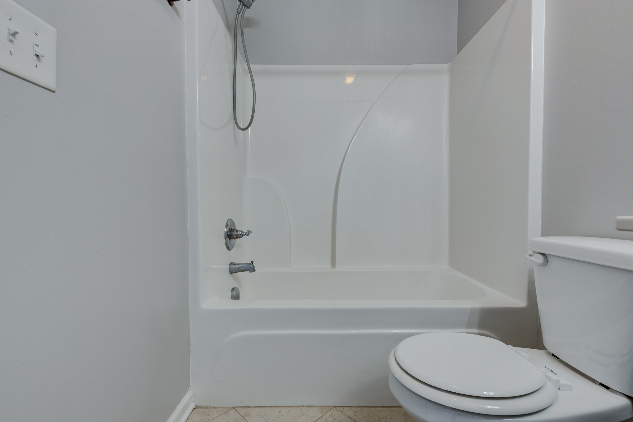 304 Oldbury Lane Spring Hill, TN 37174 - Photo 31 of 41 a bathroom with a toilet and a bath tub