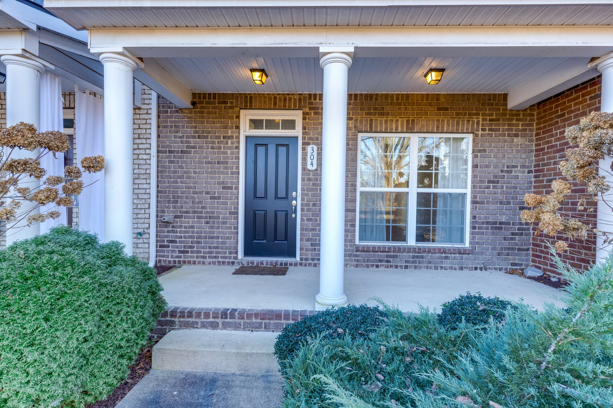 304 Oldbury Lane Spring Hill, TN 37174 - Photo 4 of 41 a view of entrance of house and front door