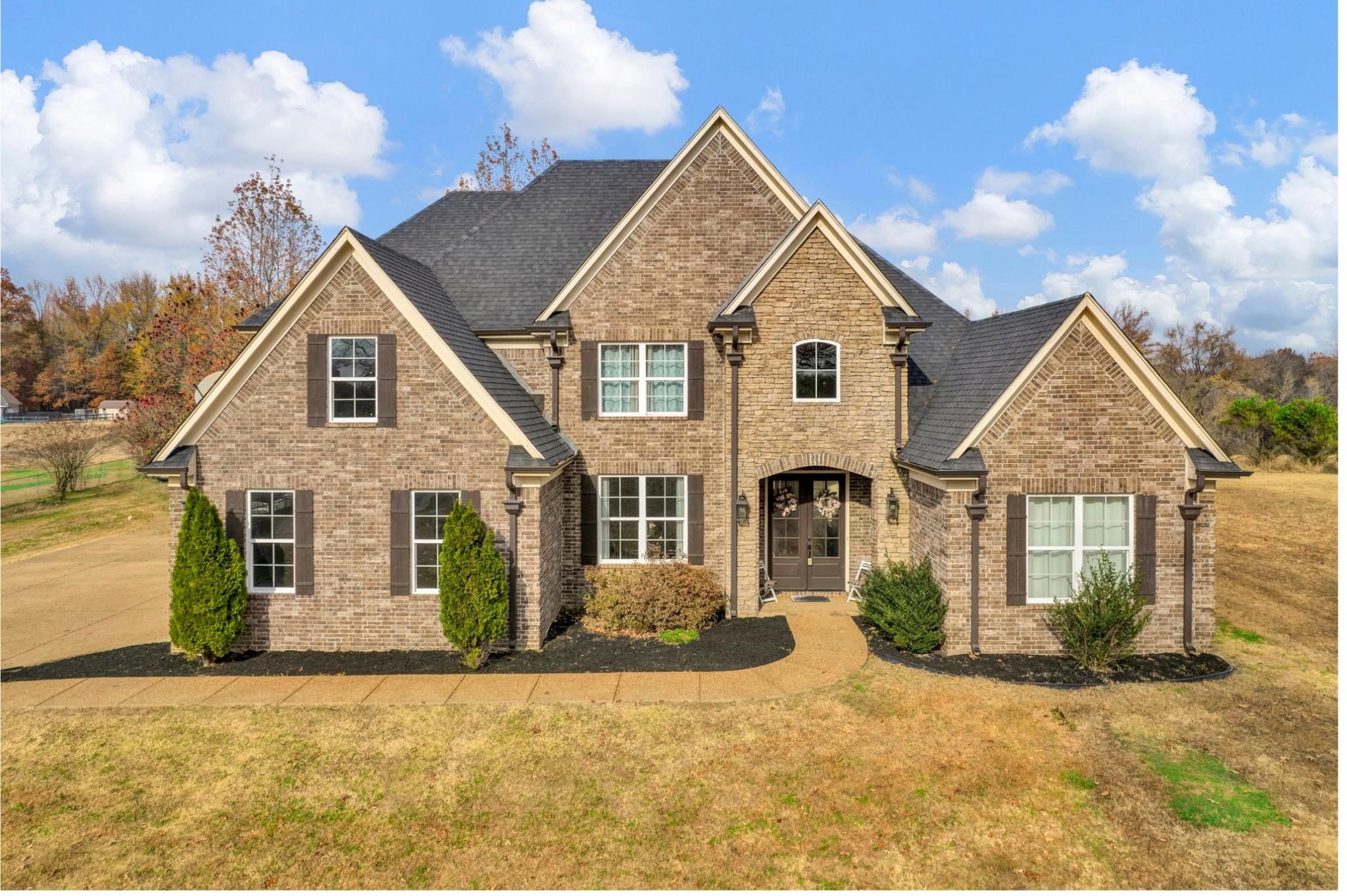 3270 Rast Road Millington, TN 38053 - Photo 4 of 40 Traditional-style house featuring brick siding, a front lawn, and french doors
