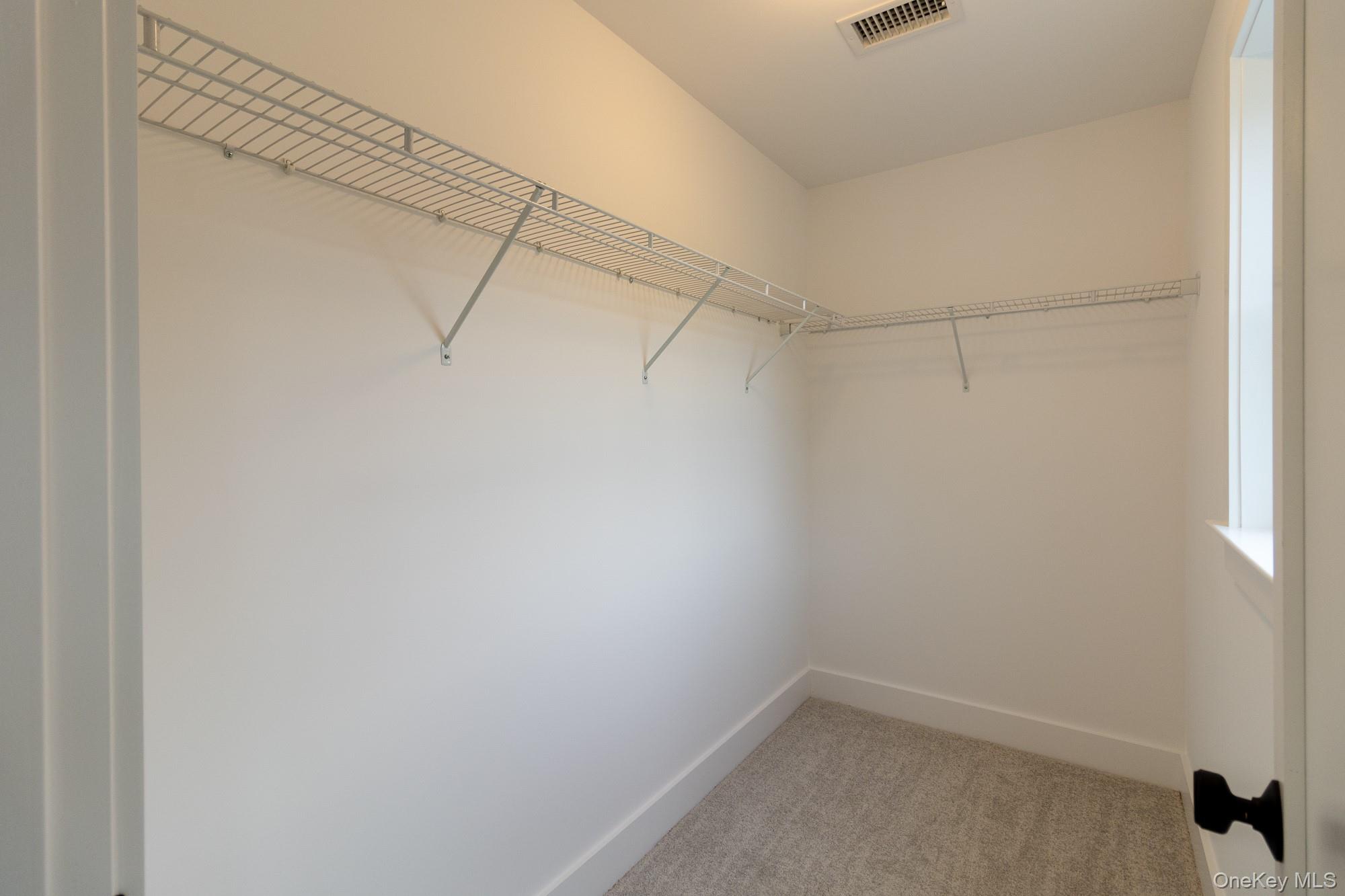 750 Ridgebury Road Slate Hill, NY 10973 - Photo 32 of 41 a view of a room with racks on the wall