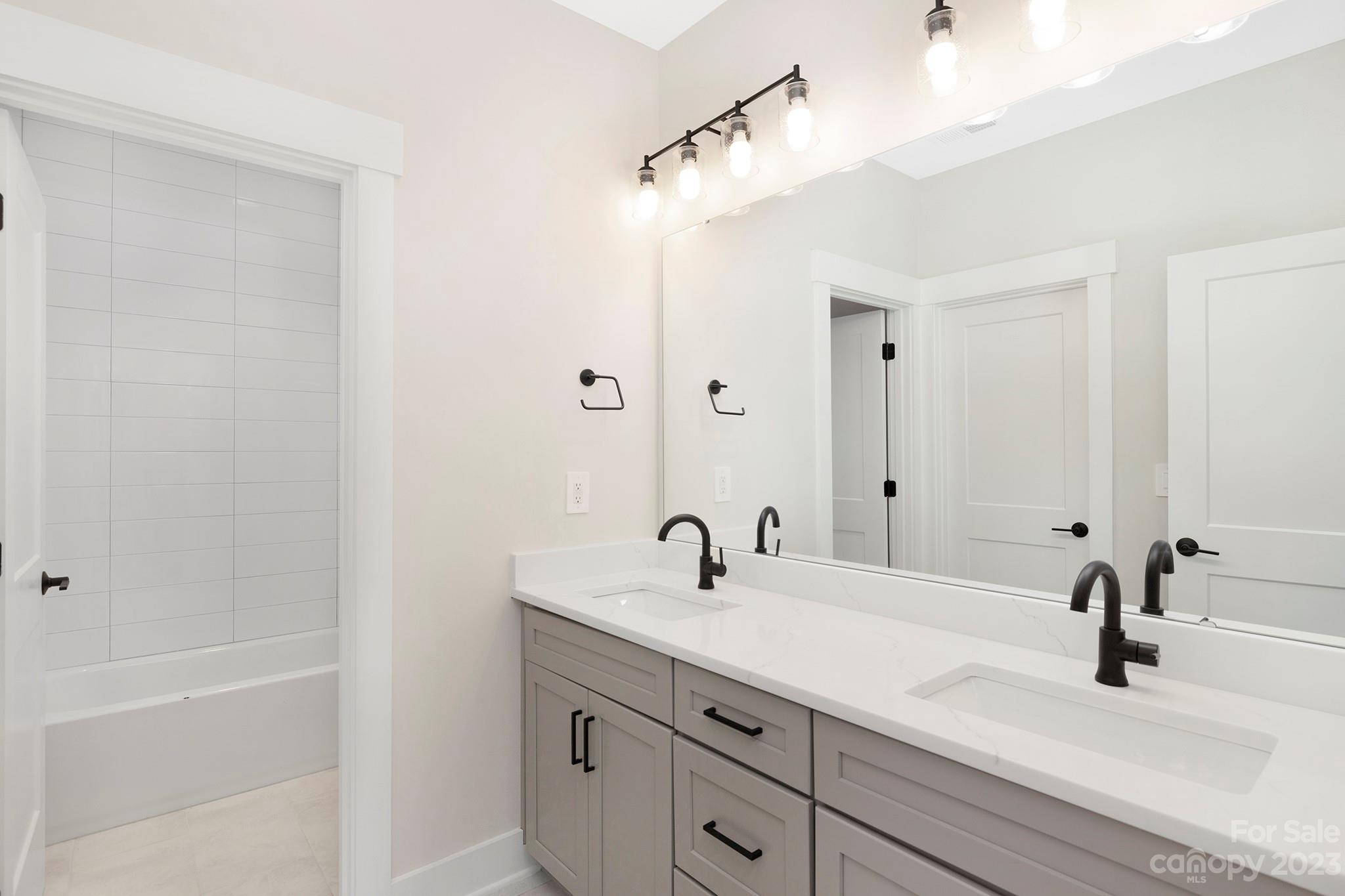 2404 Lee Lawing Road Lincolnton, NC 28092 - Photo 21 of 25 a bathroom with a sink and a mirror