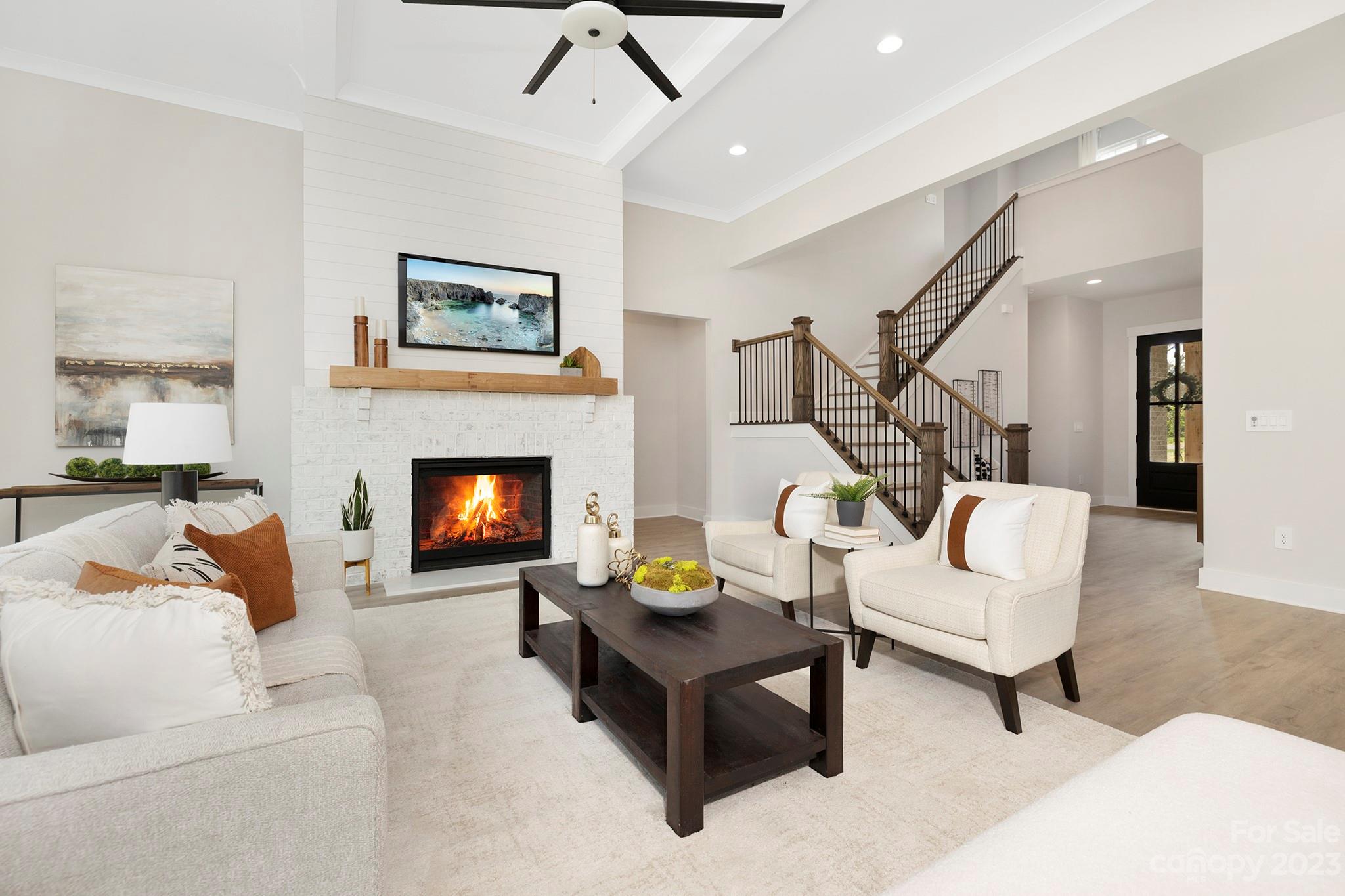 2404 Lee Lawing Road Lincolnton, NC 28092 - Photo 4 of 25 a living room with furniture and a fireplace