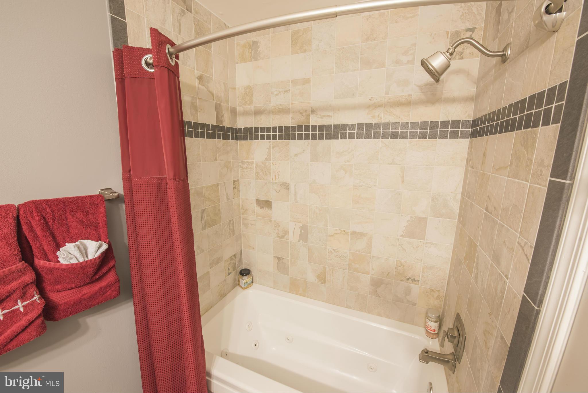 8305 Cagle Road Fort Washington, MD 20744 - Photo 25 of 30 Enjoy a nice soak in this jetted tub!