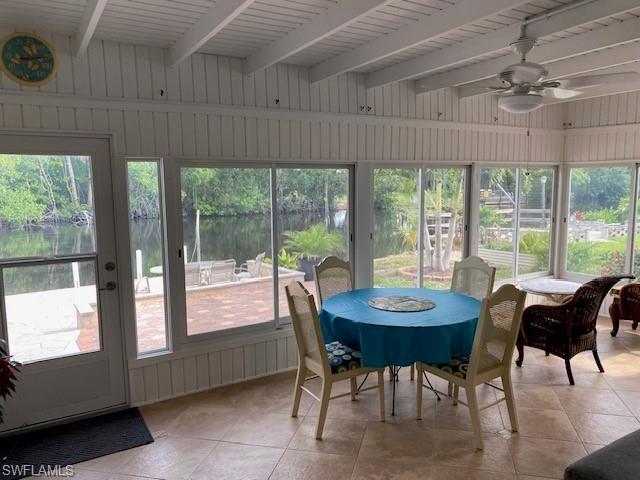 172 Riverwood Road Naples, FL 34114 - Photo 36 of 49 a view of a dining room with furniture window and outside view