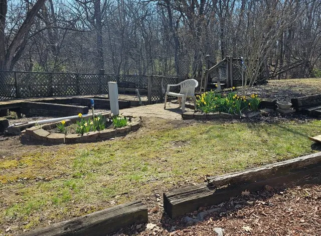 a view of a terrace with furniture