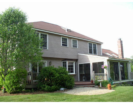 152 Flagg Hill Road Boxborough, MA 01719 - Photo 2 of 11 a front view of a house with a yard