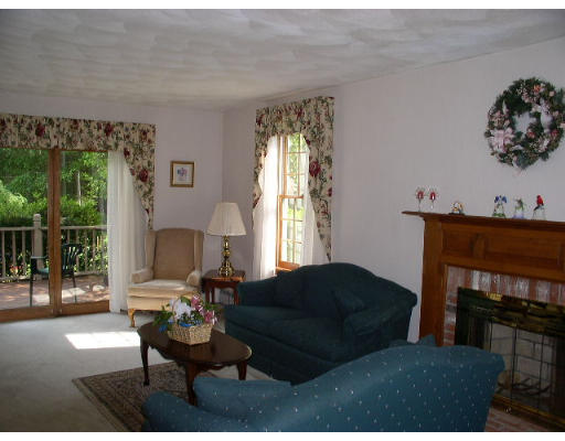 152 Flagg Hill Road Boxborough, MA 01719 - Photo 5 of 11 a living room with furniture and a large window
