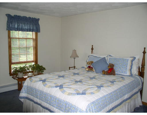 152 Flagg Hill Road Boxborough, MA 01719 - Photo 10 of 11 a bedroom with a bed and dresser