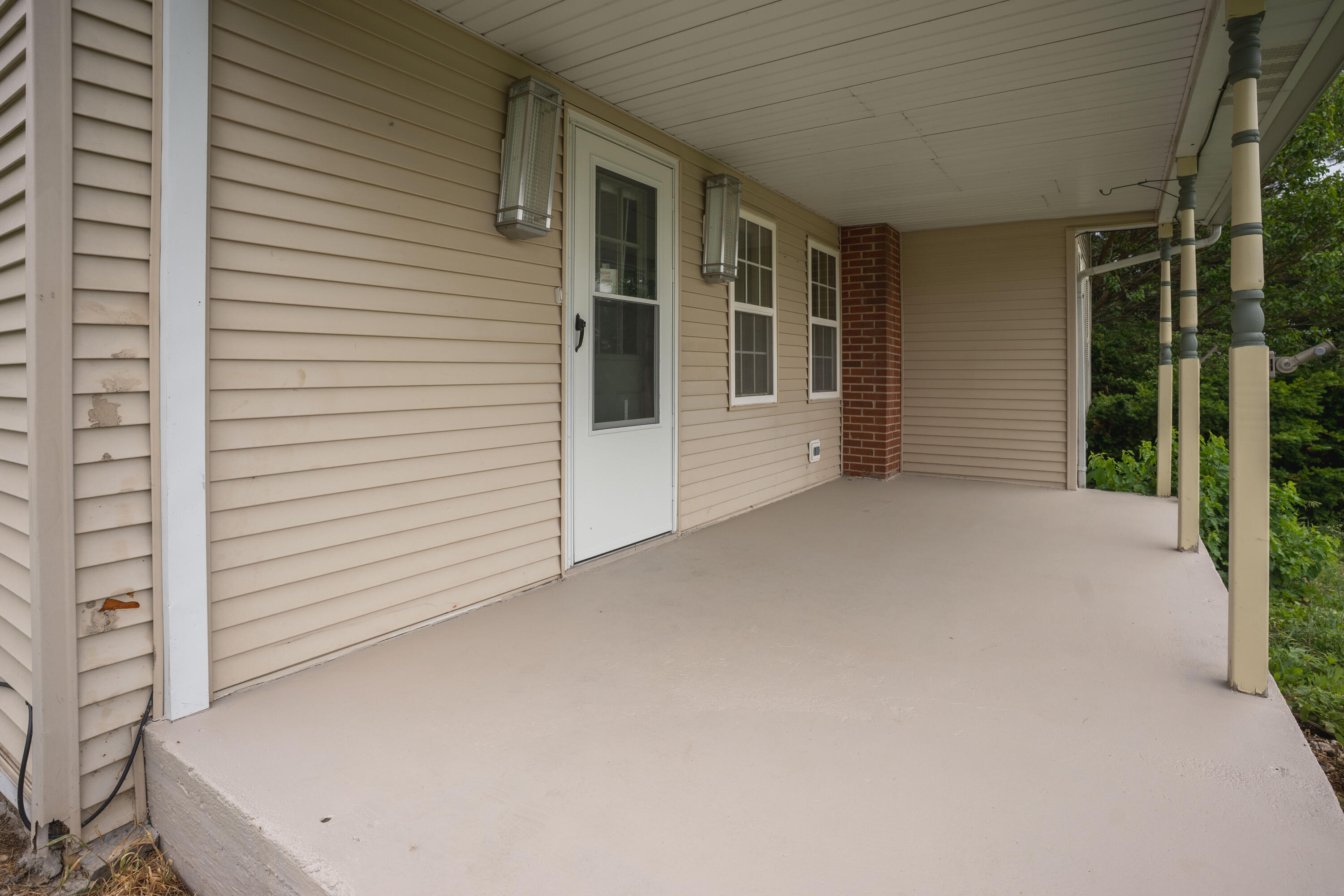 W7852 Town Hall Road Sharon, WI 53585 - Photo 2 of 49 Covered front porch