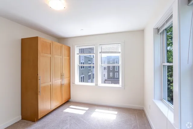 an empty room with windows