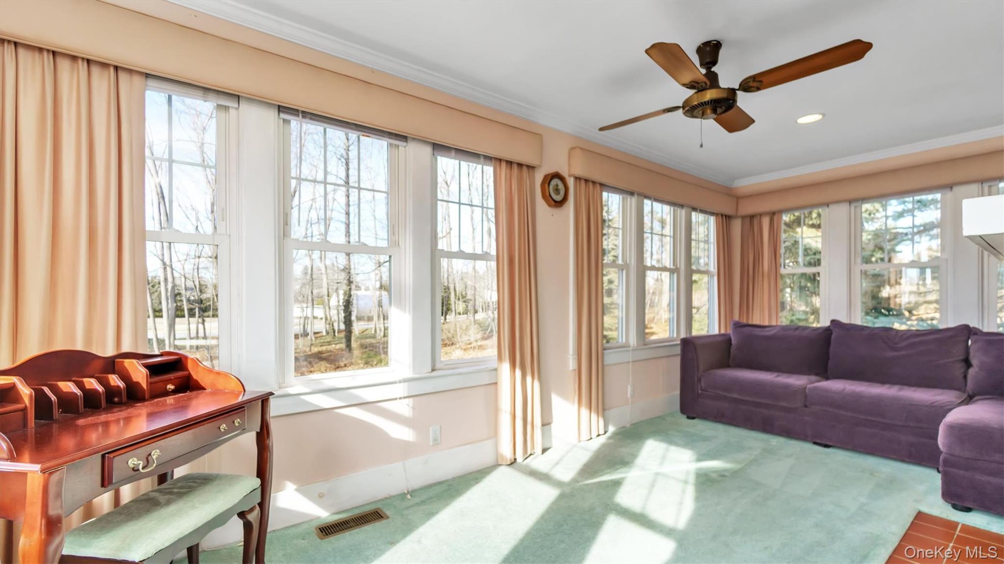 280 Wickham Avenue Mattituck, NY 11952 - Photo 13 of 41 a living room with furniture and a large window