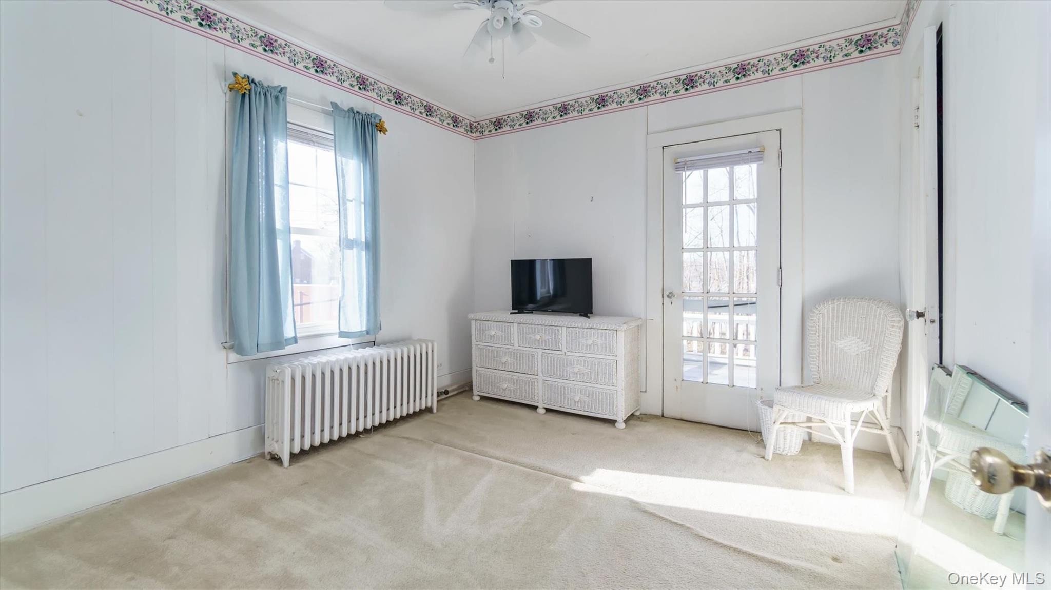 280 Wickham Avenue Mattituck, NY 11952 - Photo 30 of 41 an empty room with windows and closet