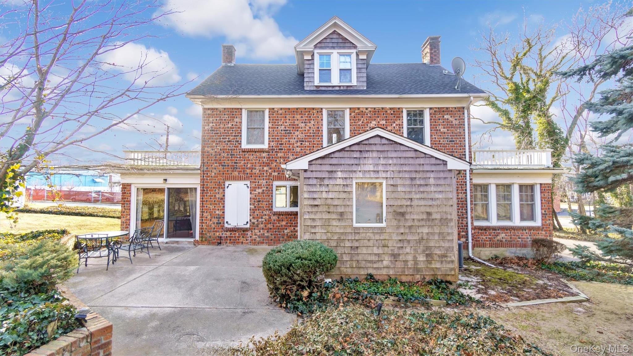 280 Wickham Avenue Mattituck, NY 11952 - Photo 7 of 41 a front view of a house with garden