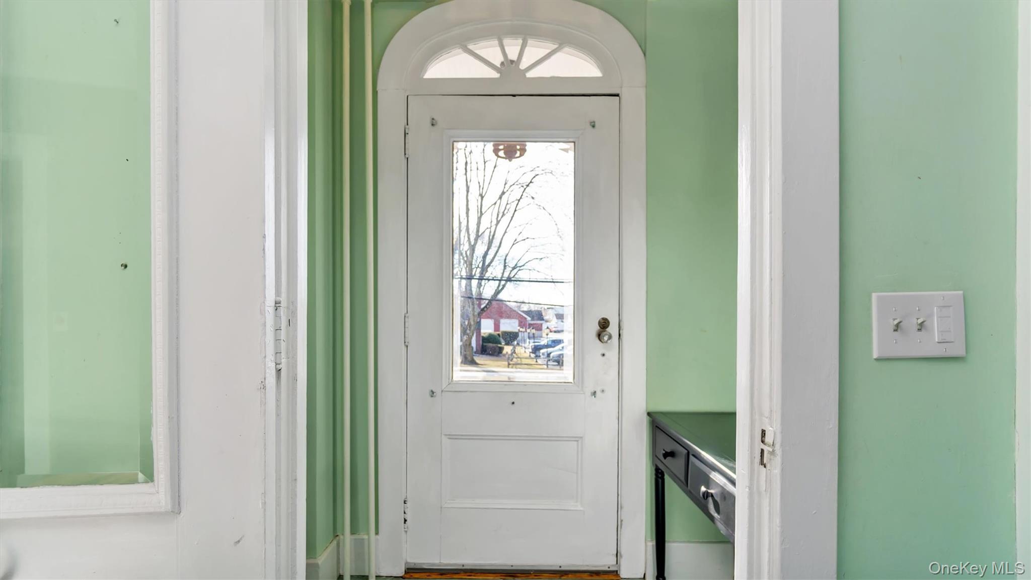 280 Wickham Avenue Mattituck, NY 11952 - Photo 8 of 41 a view of an entryway with wooden floor